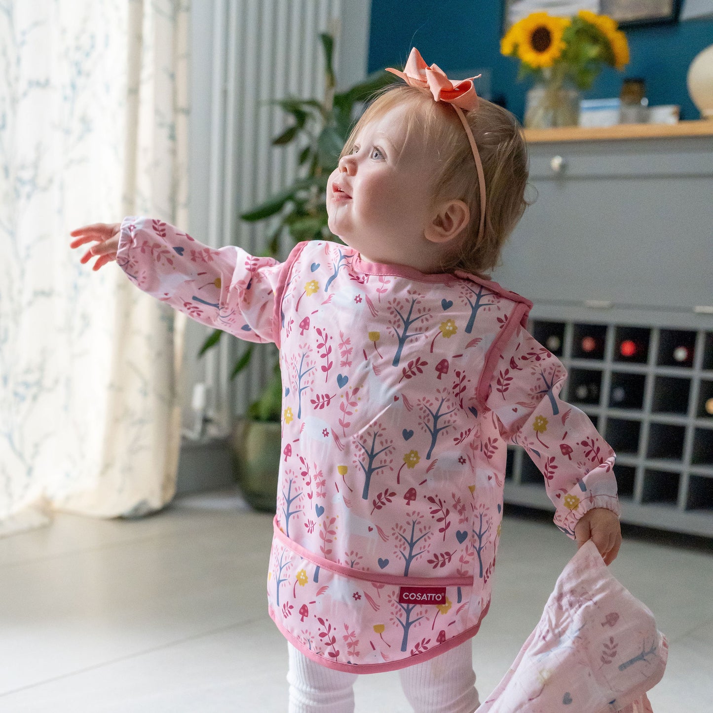 Cosatto Coverall Feeding Bib Unicorn Garden