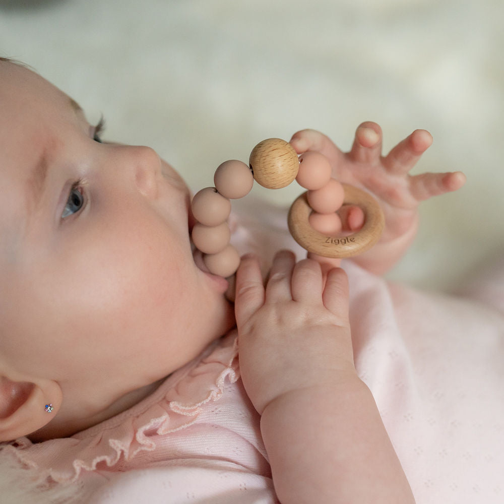 Wooden teether and rattle - blush