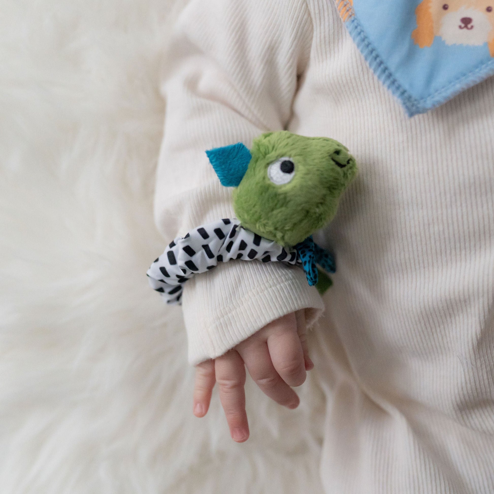 Dino and Cockapoo wrist rattles Ziggle